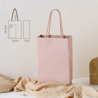dark pink paper bags with cotton handles