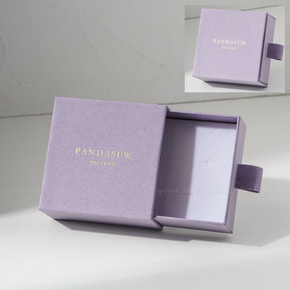 Light purple jewelry box with custom gold logo