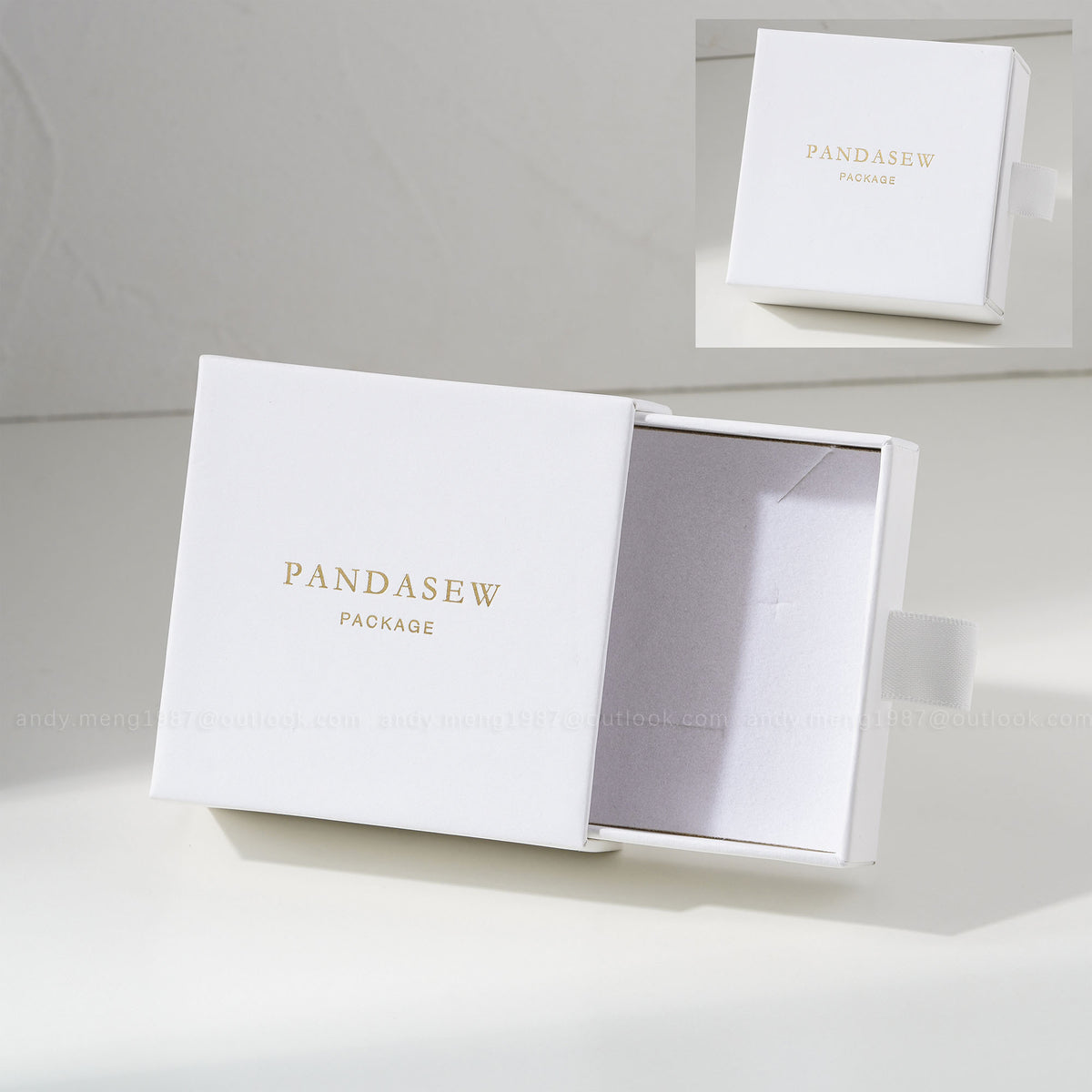 White jewelry box with custom gold logo