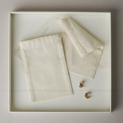 Beige drawstring bags, suitable for candles and gifts
