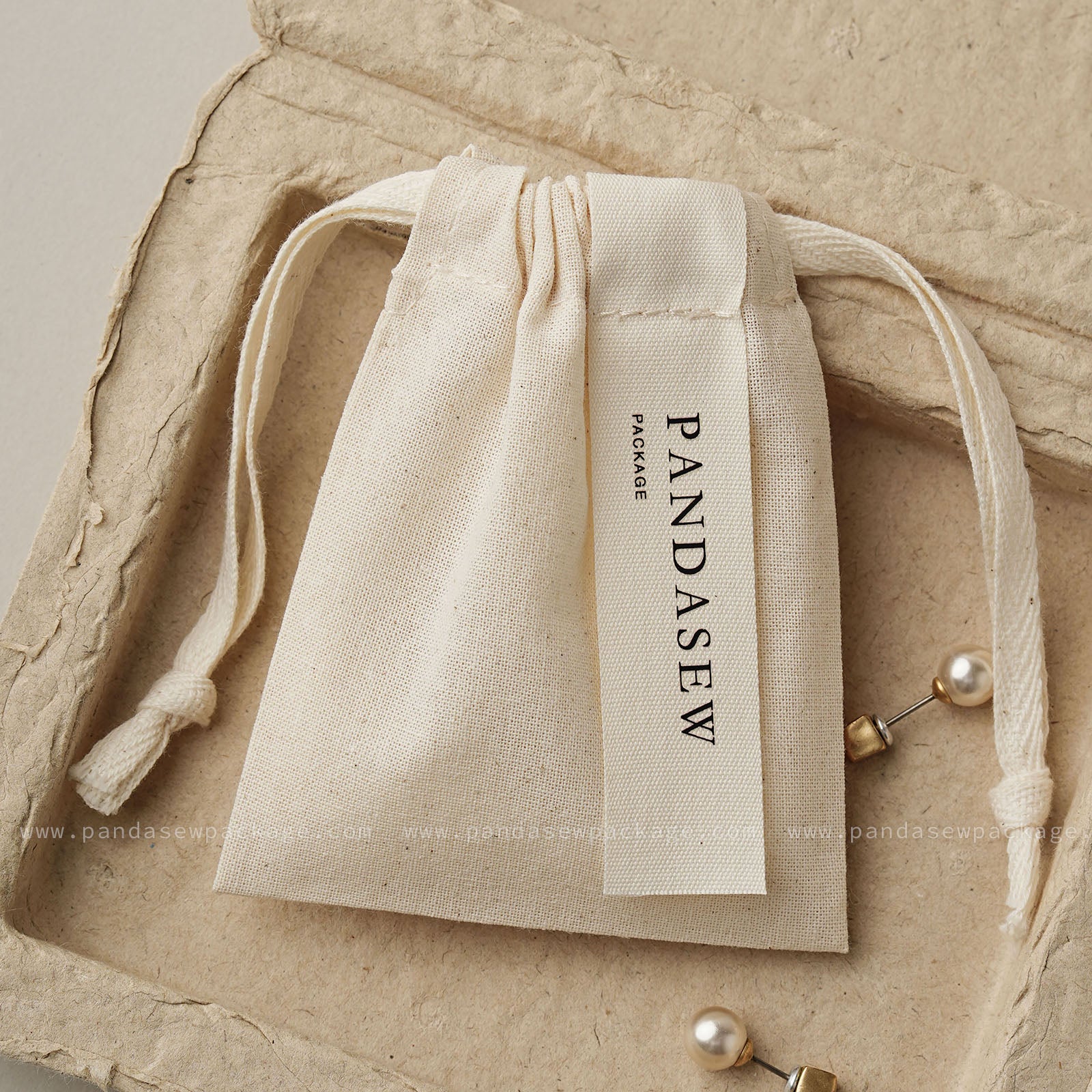 Pandasew jewelry cotton pouch with logo printing on label
