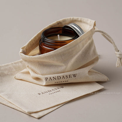 beige cotton bag for perfume, candles and presents