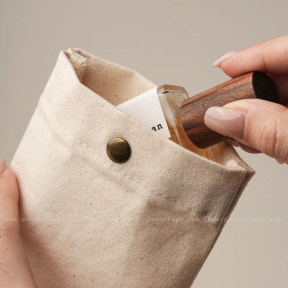 Beige canvas snap bag with metal snap closure, hand craft gift packaging