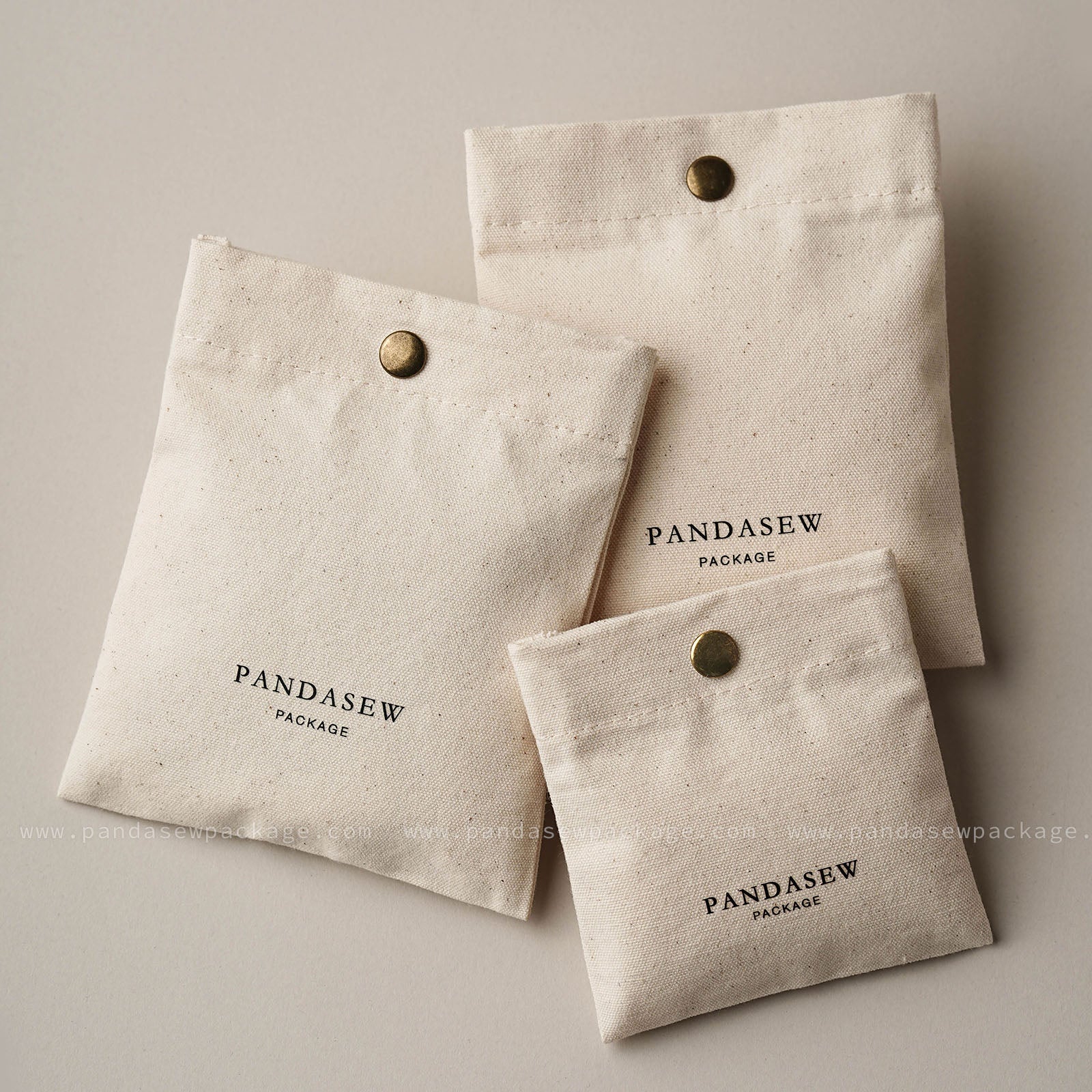 Beige canvas snap bag with metal snap closure, hand craft gift packaging