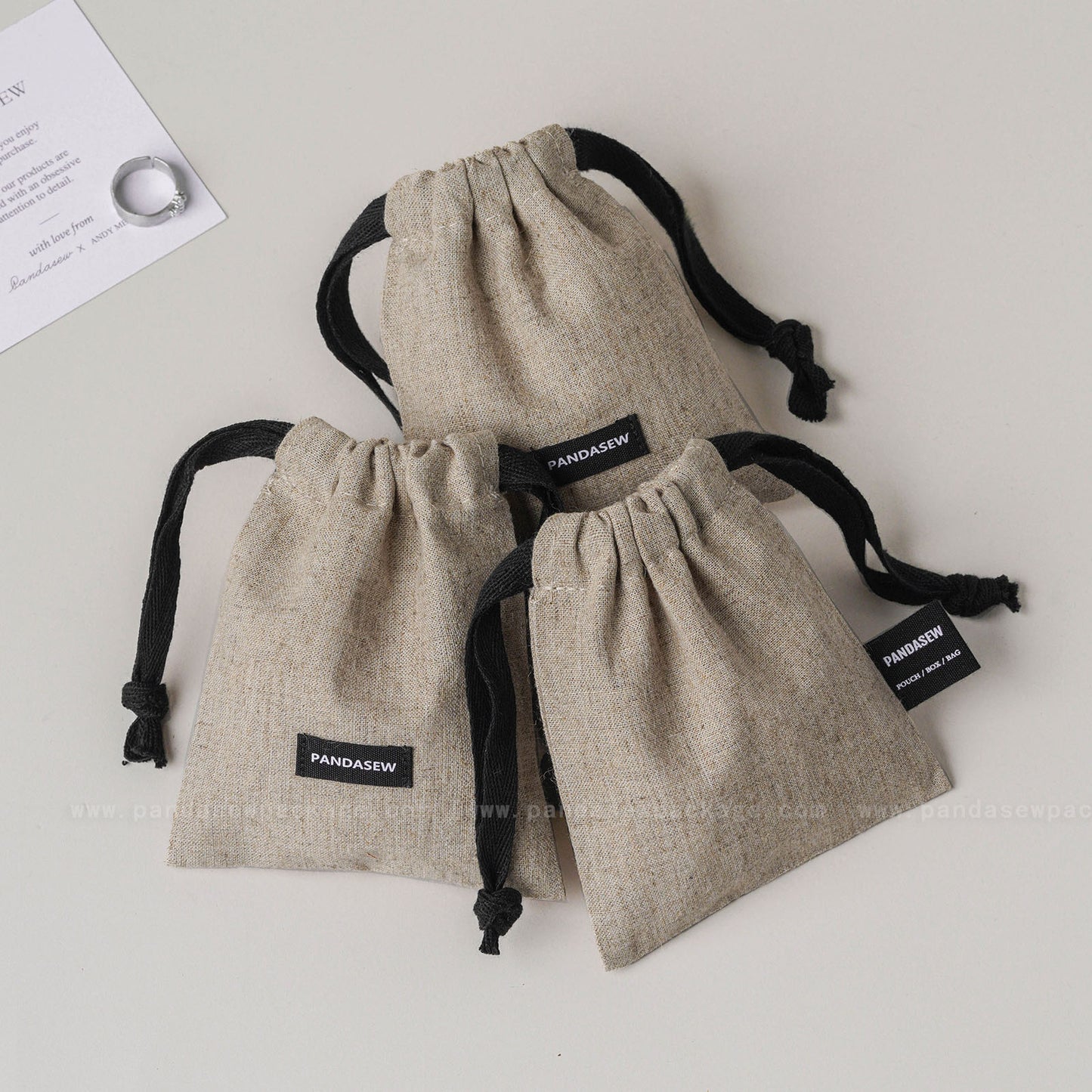 100pcs Linen Drawstring Bag Custom Logo on Label Jewelry Package Gift Bag LN-115