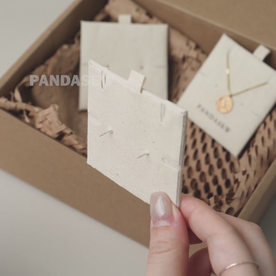 PANDASEW Elegant jewelry set in sustainable cotton pouches. Ideal for gifting or personal use, eco-friendly earrings packaging