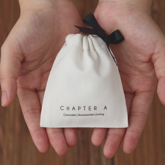 white cotton canvas with single sided grosgrain ribbon drawstring bag