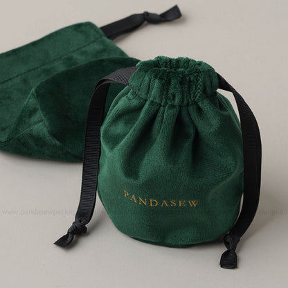 Dark green velvet drawstring Pandasew bag. Aromatherapy/jewelry storage with custom logo