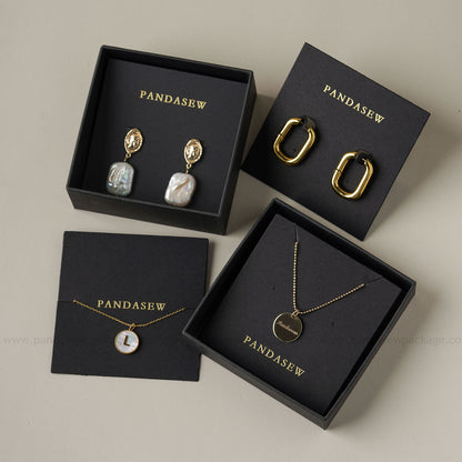 Pandasew earring cards deboss gold logo black