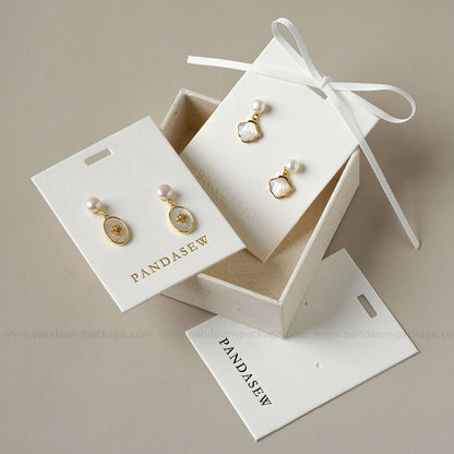 Pandasew earring cards deboss gold logo