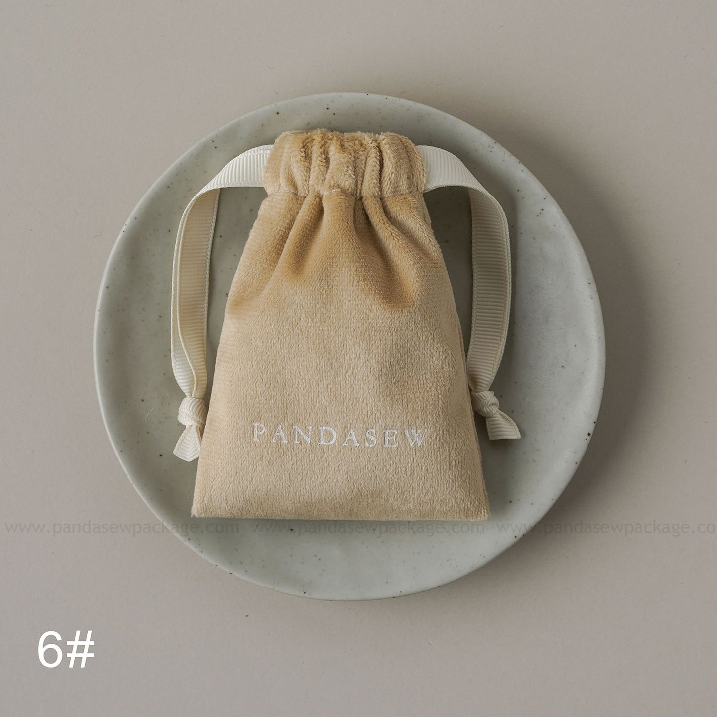 Nude velvet drawstring Pandasew bag. Aromatherapy/jewelry storage with custom logo