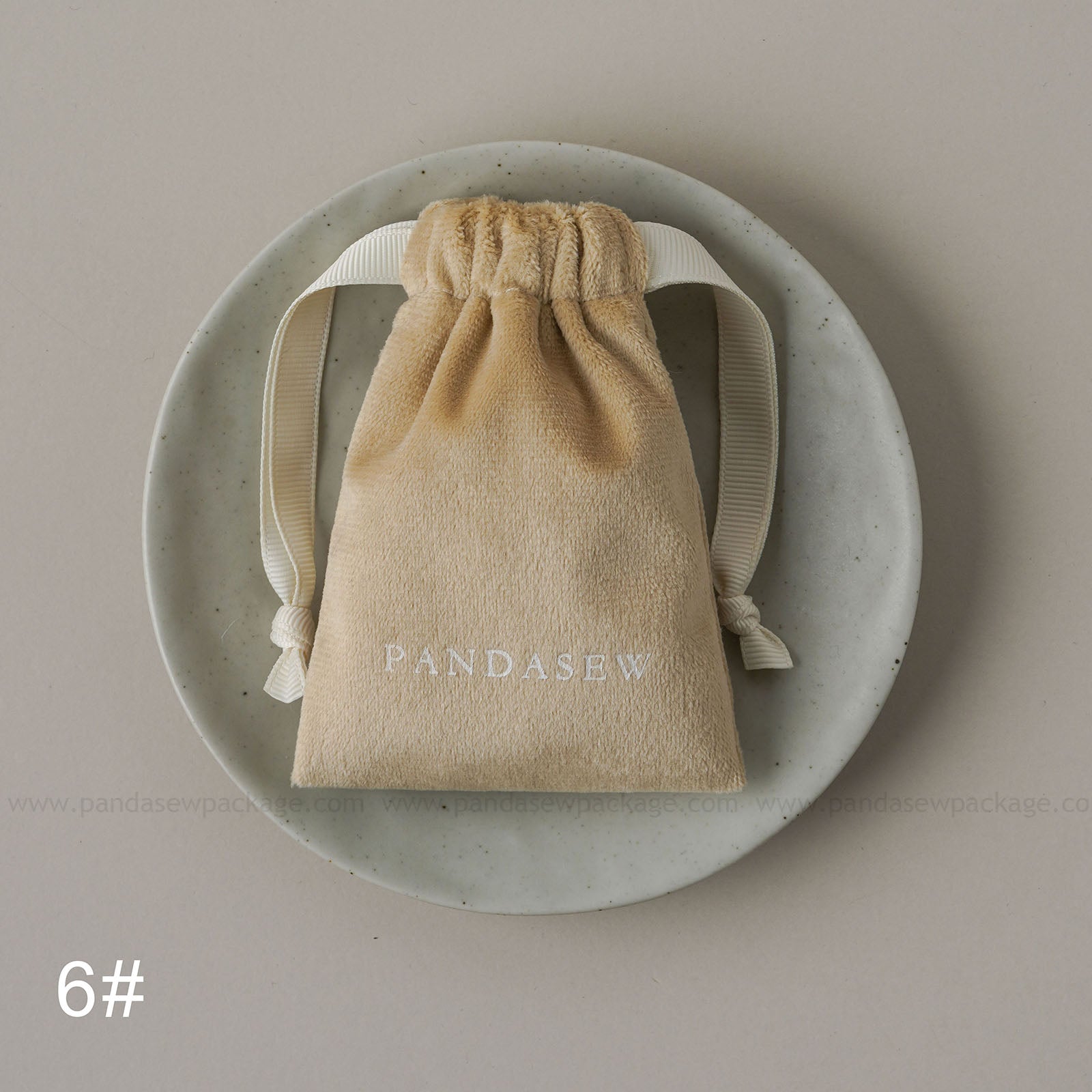 Nude velvet drawstring Pandasew bag. Aromatherapy/jewelry storage with custom logo