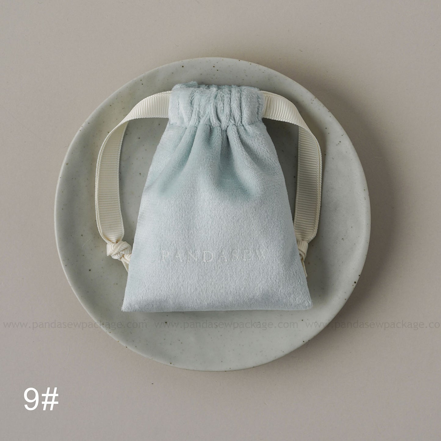 Blue velvet drawstring Pandasew bag. Aromatherapy/jewelry storage with custom logo