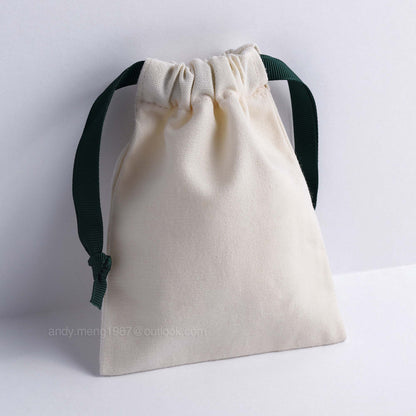 beige canvas drawstring bag