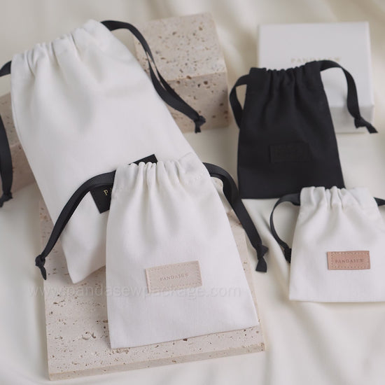 Pure cotton pouch drawstring bag with logo debossing