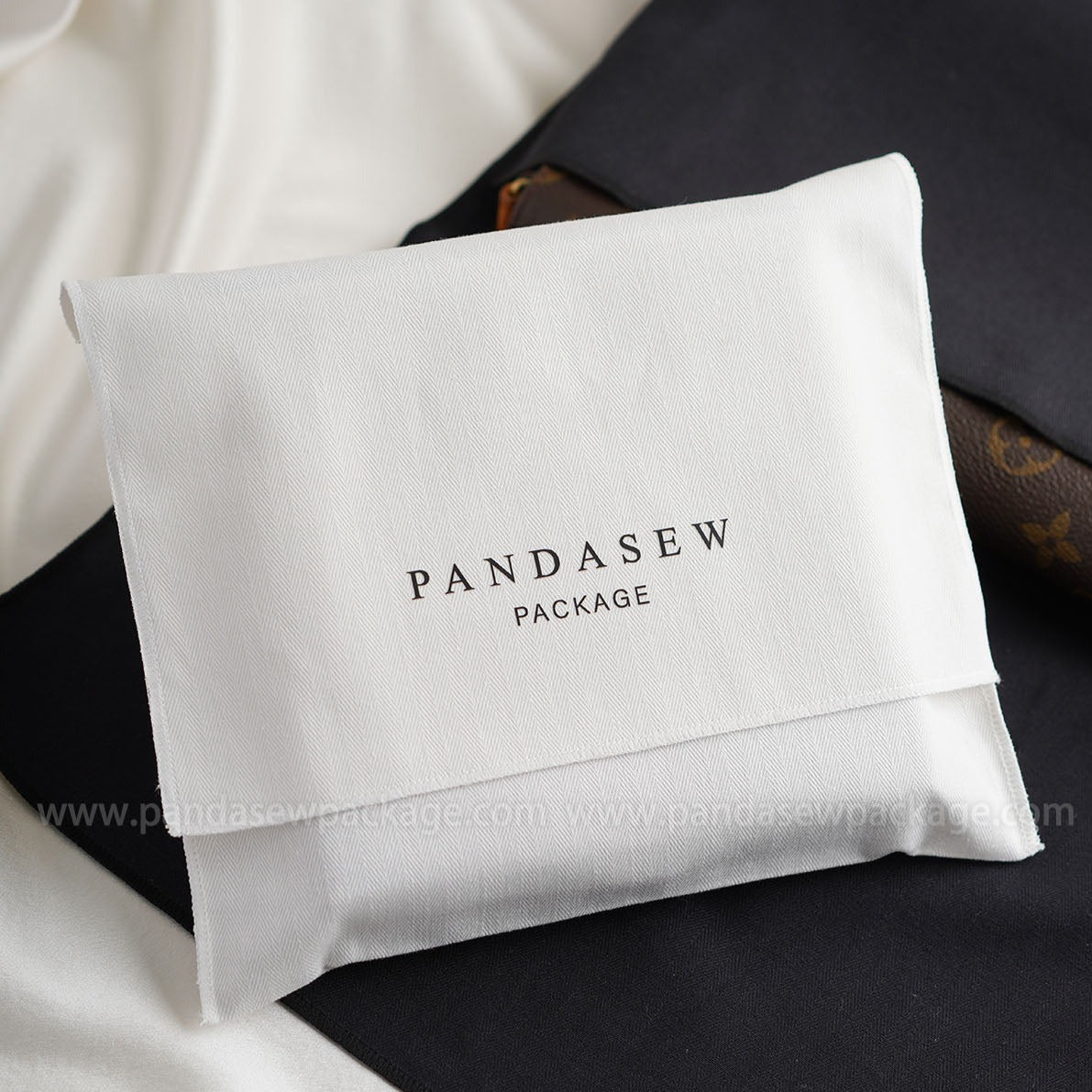 white cotton envelope bag with silkscreen logo