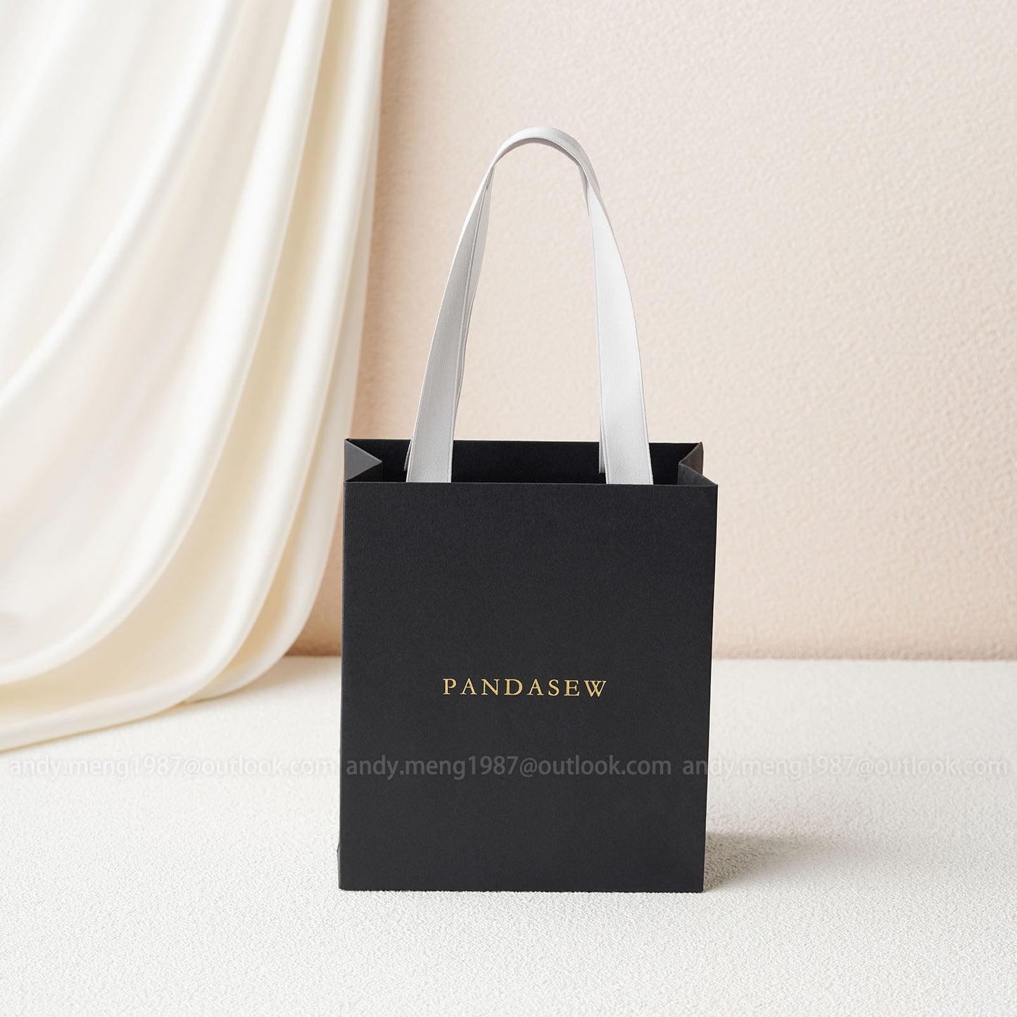 black paper bags with handles