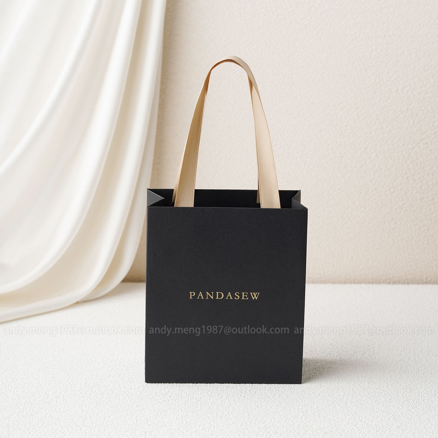 black paper bags with handles