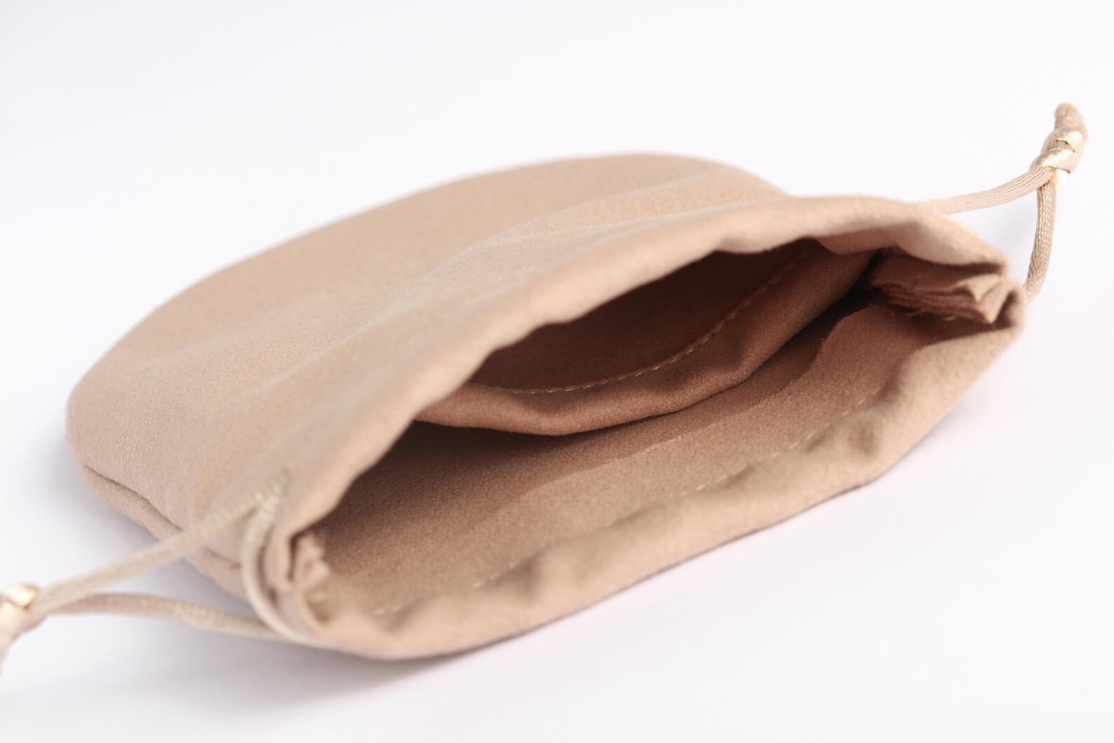 half round style velvet pouch with small divider inside for earrings and rings