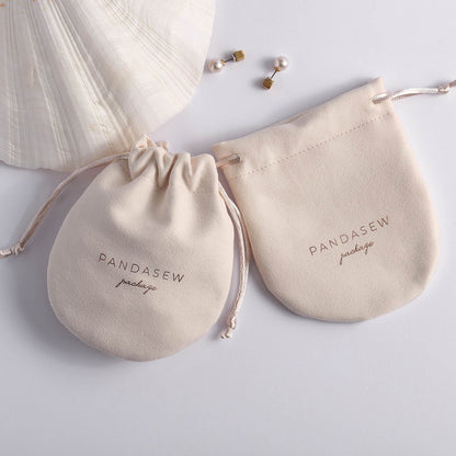 beige velvet bag with nude smooth string drawstring, jewelry packaging