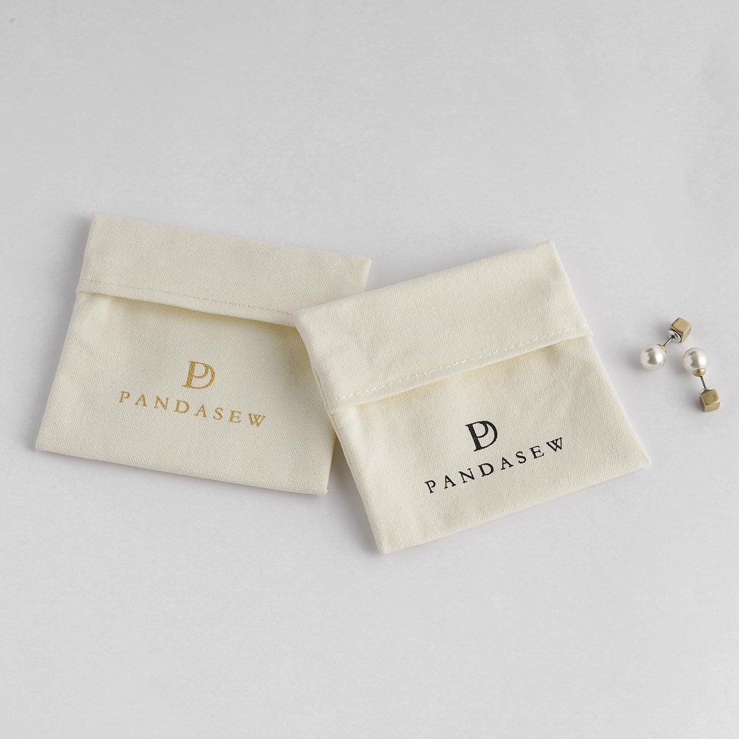earring necklace bags in beige cotton fabric