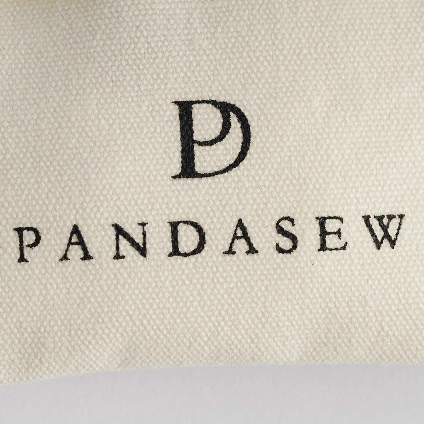 black printing logo on beige cotton canvas pouch