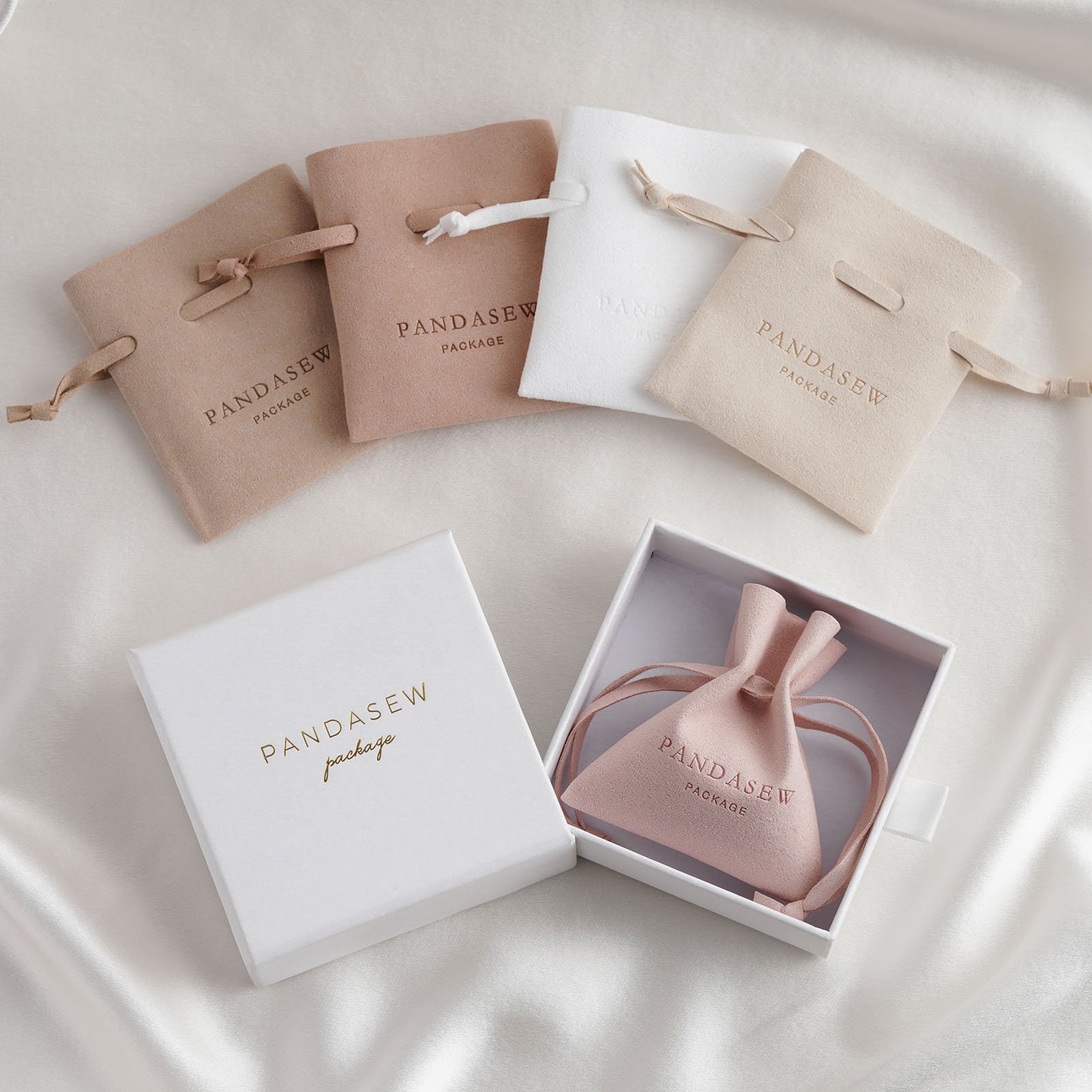 string pouch with debossed logo