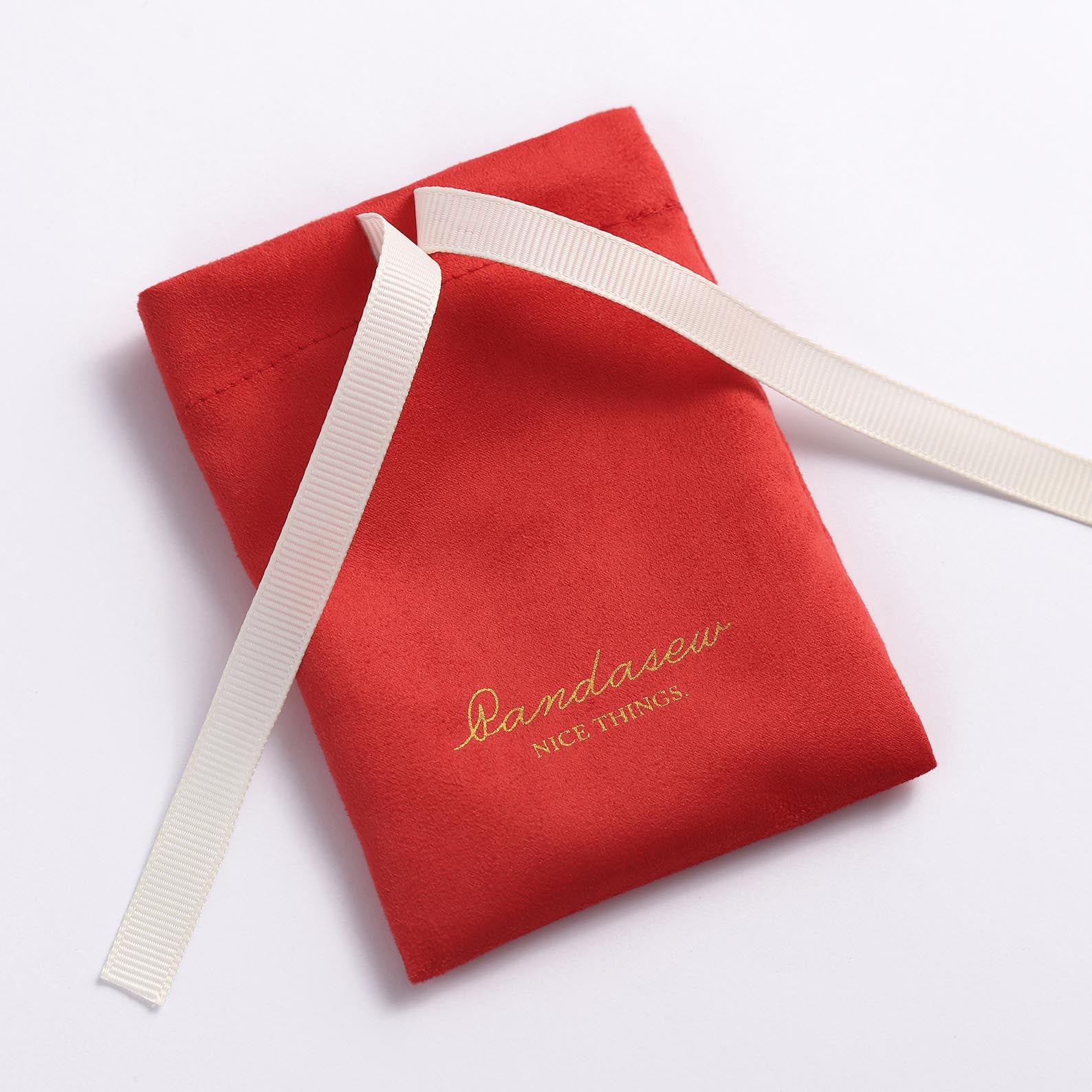 ribbon bow tied grosgrain  drawstring on white flannel bag, branding logo jewelry pouch