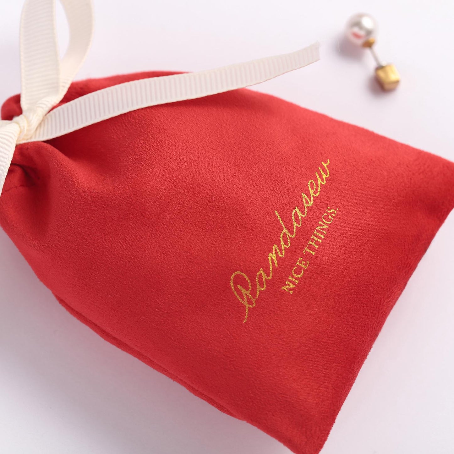 ribbon bow tied grosgrain  drawstring on white flannel bag, branding logo jewelry pouch