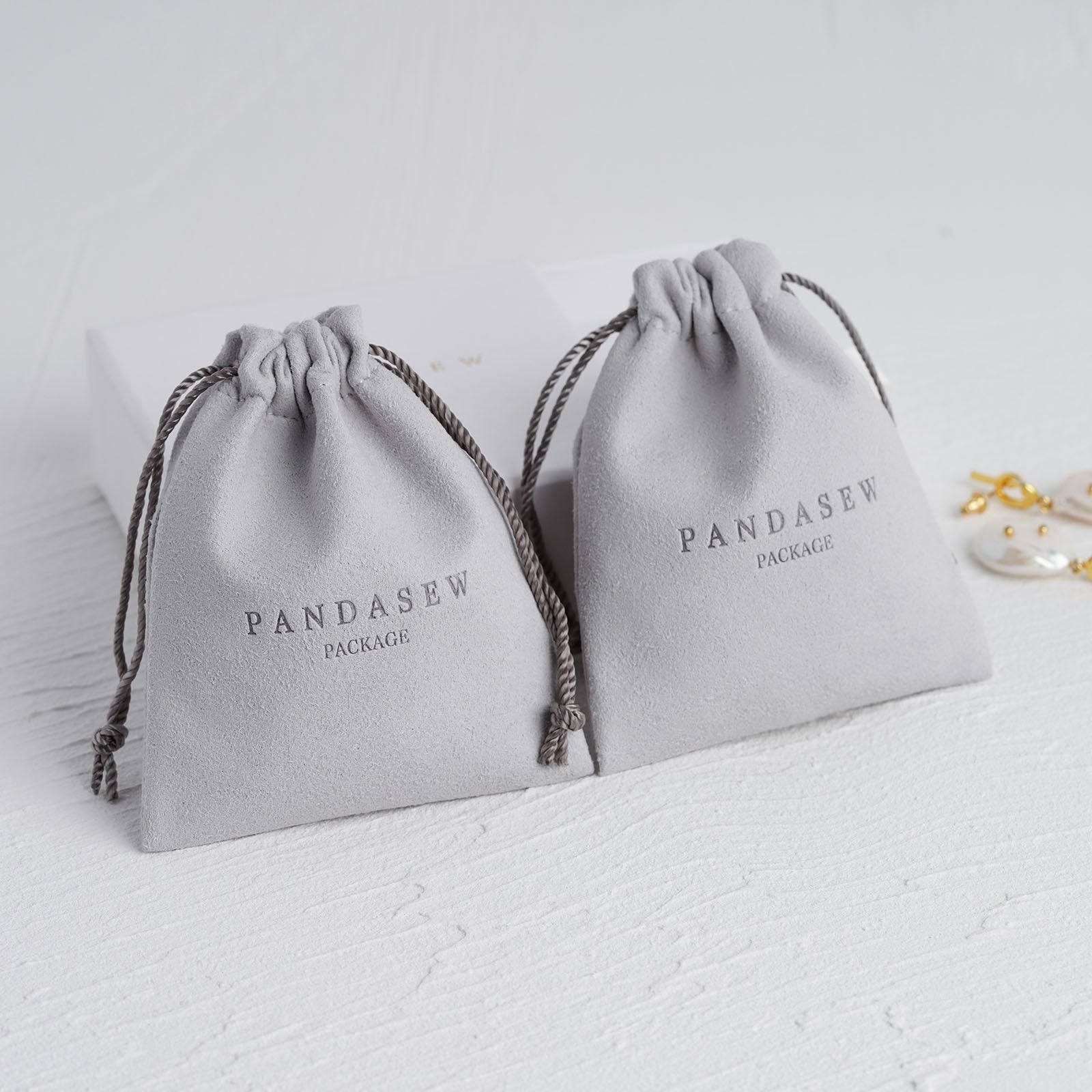 Gray microfiber drawstring pouch